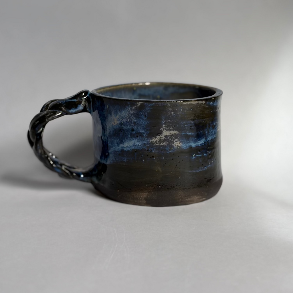 Mug with a braided handle