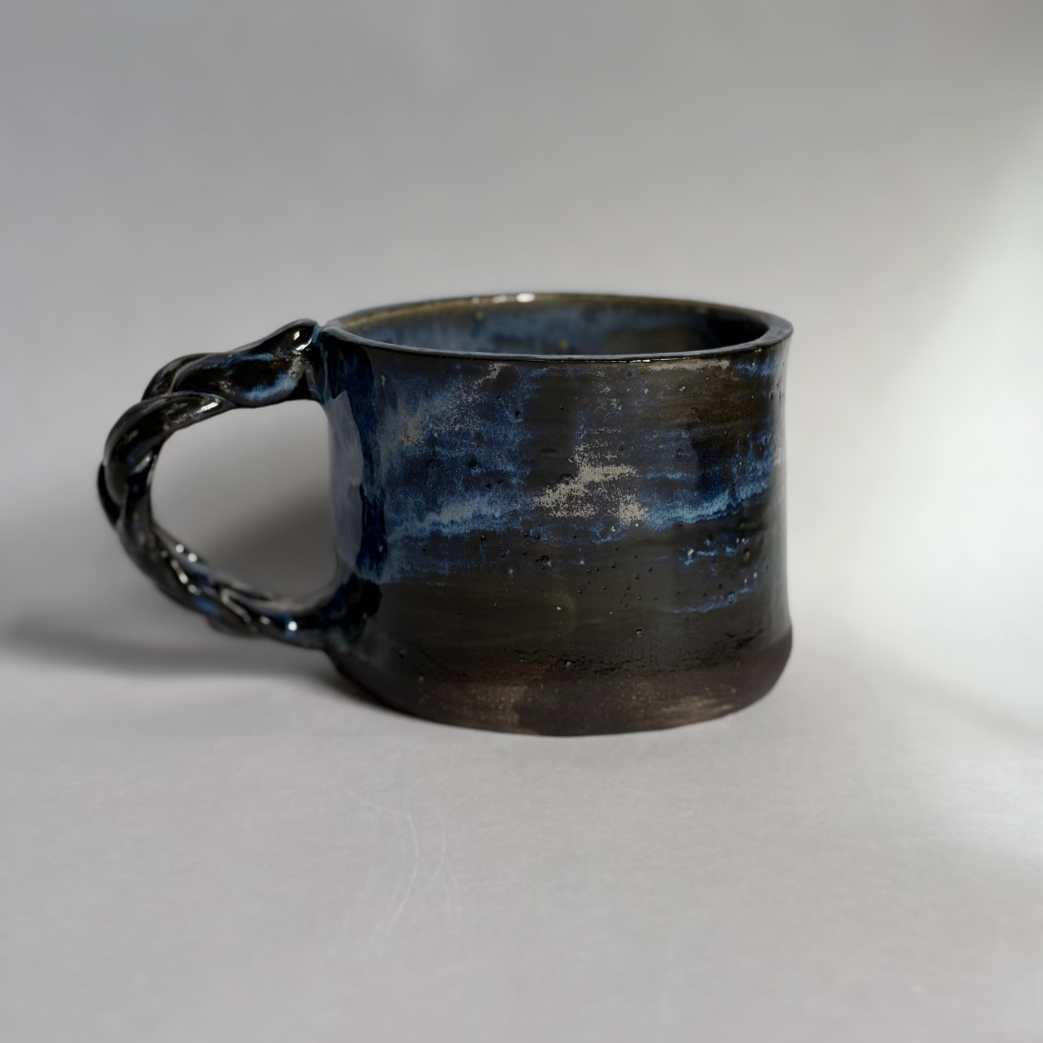Mug with a braided handle