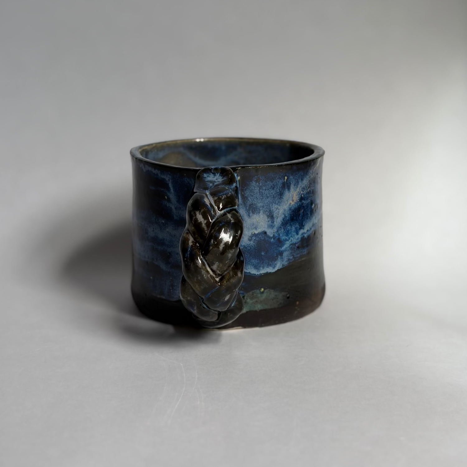 Mug with a braided handle