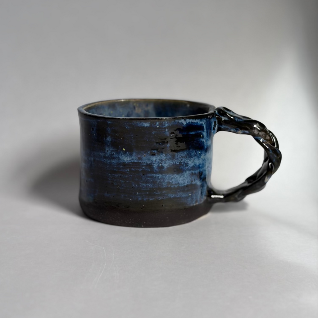 Mug with a braided handle